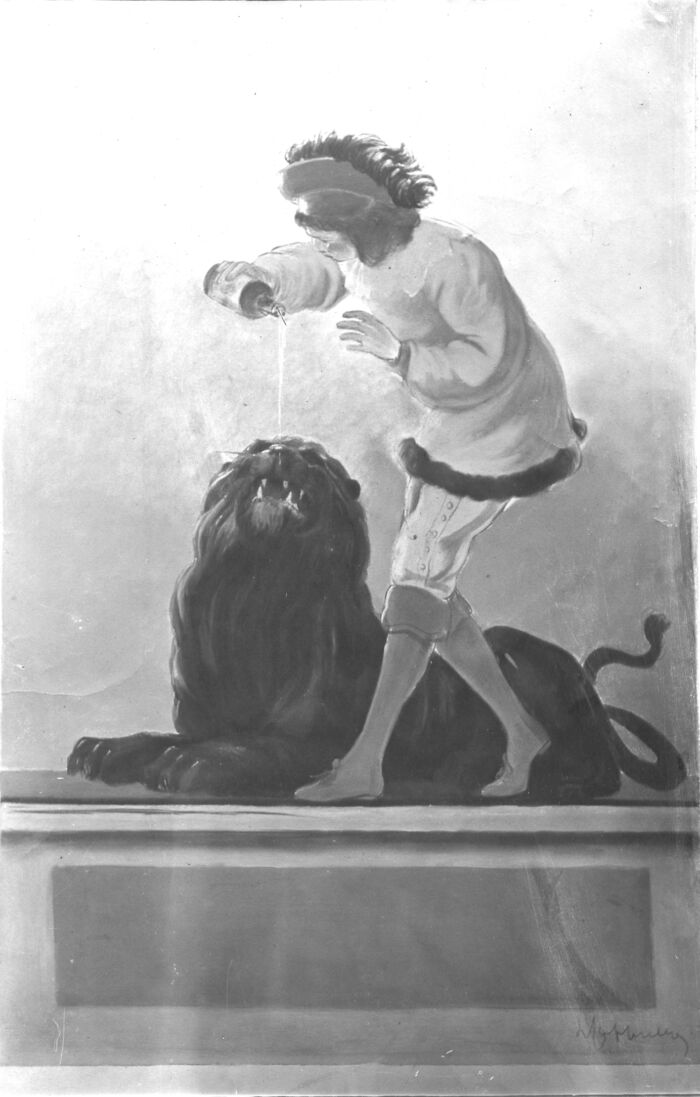 1913 ca. - Un homme s'approche d'un lion avec une potion. Il donne l'impression d'avoir dompté le lion. avant même de lui avoir administré le médicament