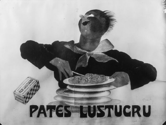 1932 - Un gourmand prend une assiette pleine de pâtes.